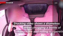 Video Shows a Man Rolling Cigarettes and Chugging a Bottle of Champagne in His Work Van