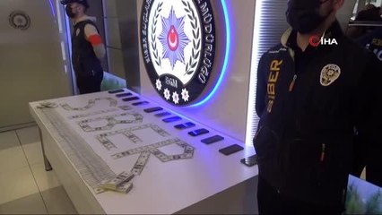 ATM'ye sahte dolar yatırıp gerçek para çeken şüphelilerden 2'si tutuklandı