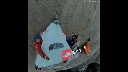 Mountain Climbers Camp Suspended on Rock Wall