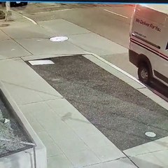 African-American male suspect swinging a bat at a woman’s head from behind.