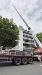 Market Street is blocked off as a massive crane starts work on the Kells building revamp