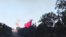 Large air tanker dropping retardant on the Goonoo Forest bushfire