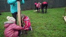 Pupils from Wellfield school learn how to plant trees