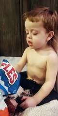 Child Struggles to Choose Between Sleep and Snacks