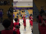 Disabled Player Scores a Basket and Celebrates with Crowd