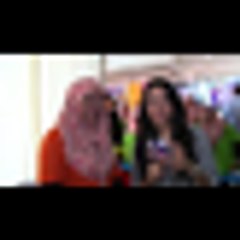 Norjuma : Cipta Rekod Dengan 1250 Tudung