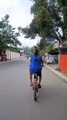 Cat Goes for Ride on Biking Human's Shoulders