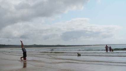 Ron Aggs sets record for longest distance whilst doing a headstand on a skimboard
