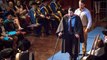 Paralysed student uses robot legs to walk on stage at graduation