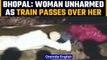 Bhopal man saves young woman trapped under a train | Watch Viral Video | OneIndia News