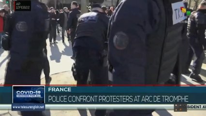 FTS 12:30 12-02: Paris police confront protesters at Arc de Triomphe