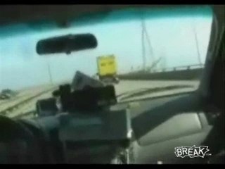 Truck Somehow Avoids Tipping On Highway