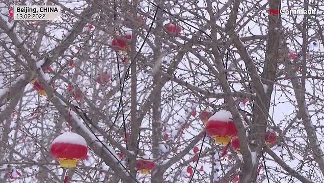Beijing wakes up to the city's first new snowfall of the Winter Olympics