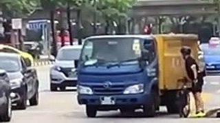 Truck Driver Tries To Run Over Cyclist, Gets Beat Up