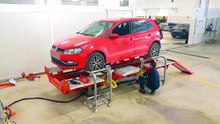 VW Polo loaded on Celette Rhone bench ready for repair