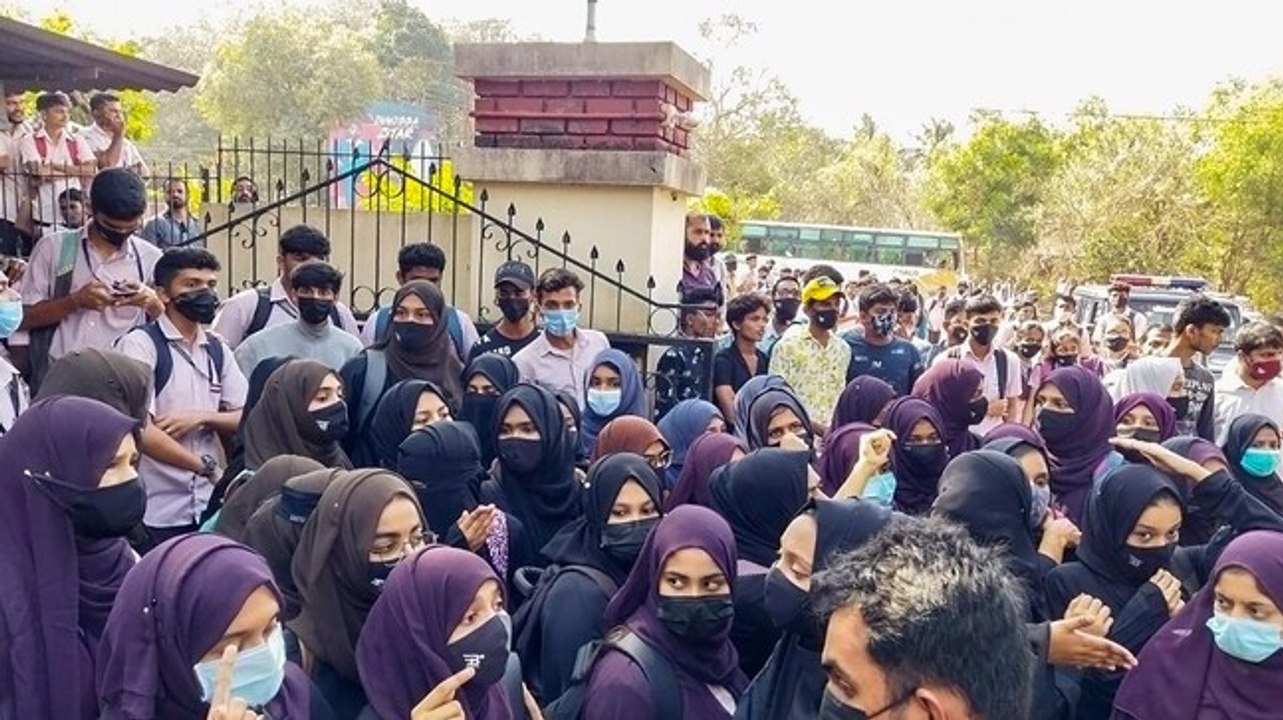 Hijab row: Schools reopen in Karnataka after fi...