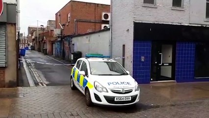 Police vehicles outside Bar Bloo