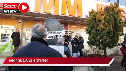 Migros'a siyah çelenk