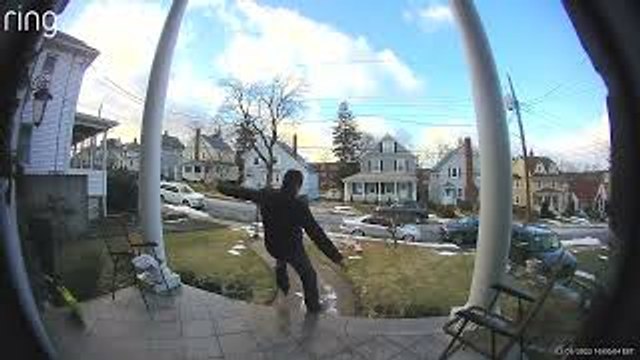 Doorbell Cam Captures Man Slipping and Falling Down Icy Steps