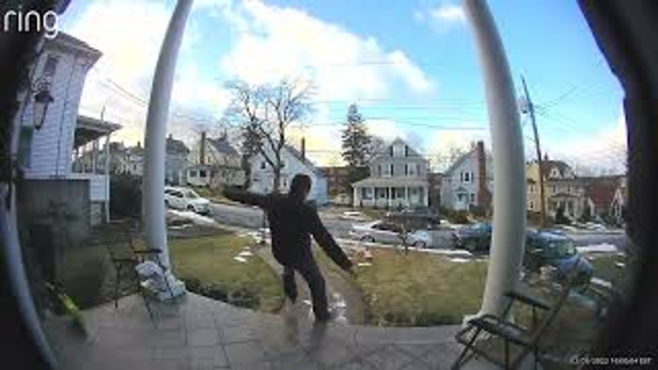 Doorbell Cam Captures Man Slipping and Falling Down Icy Steps