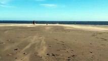 Sand blasts across the beach at Seaburn during Storm Dudley