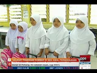 Gelagat pasangan kembar hari pertama sekolah