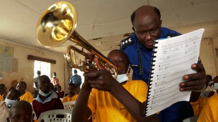 Kenyan Police Officer Conducts School Band To Connect With Community
