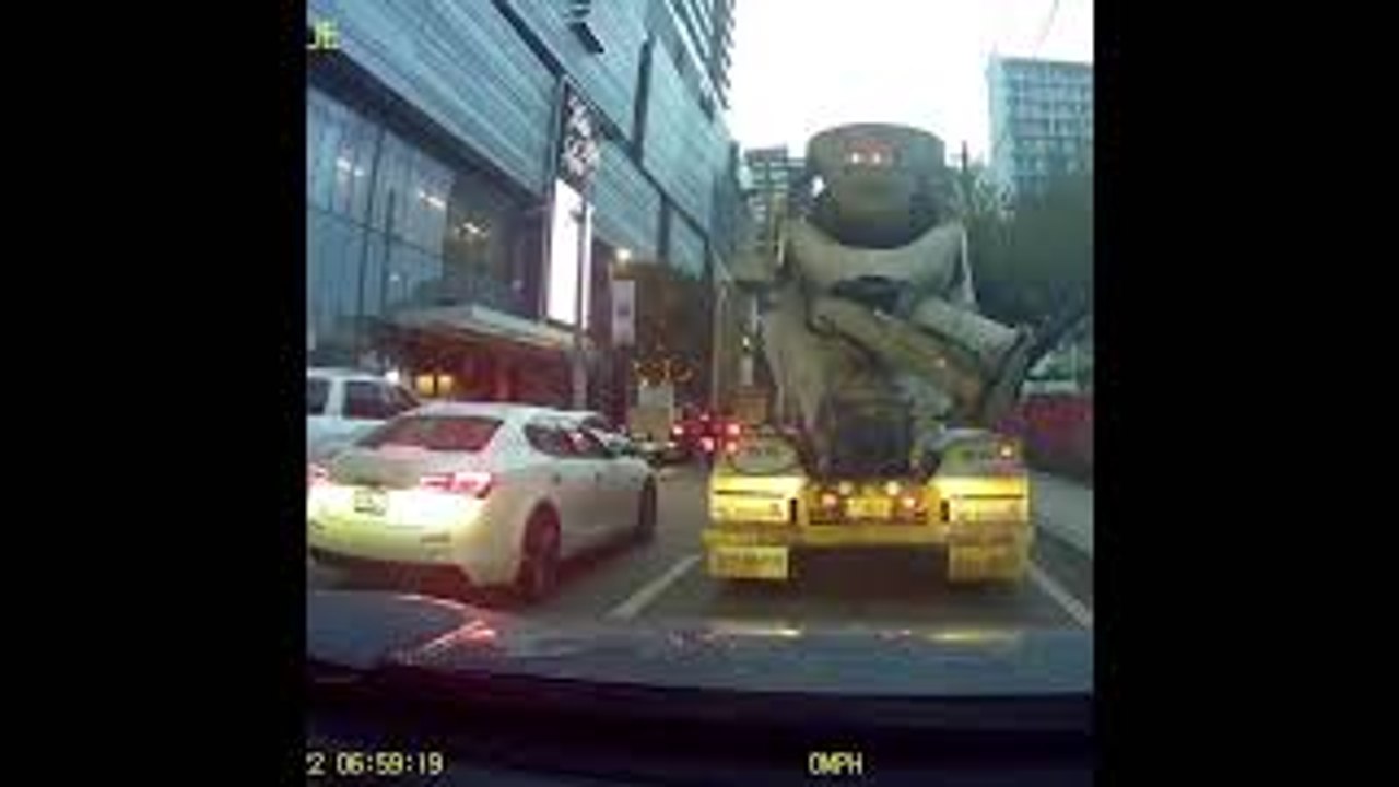Bicycle Courier Almost Crushed by Truck