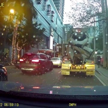 Bicycle Courier Almost Crushed by Truck