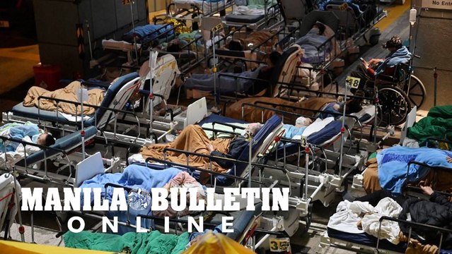 Patients outdoors in the cold as Hong Kong hospital buckles under Omicron wave