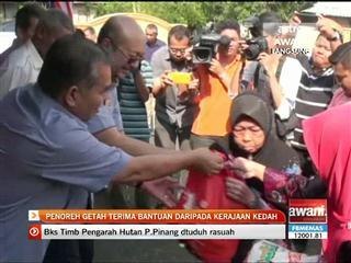 Penoreh getah terima bantuan daripada kerajaan Kedah
