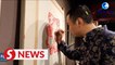 Chinese craftsmen cheer for Beijing Winter Olympics with innovative artworks