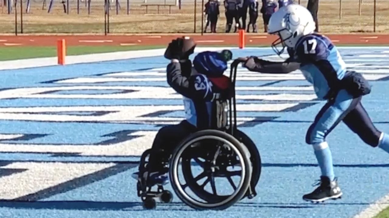 Boy With Spina Bifida Scores Surprise Touchdown In Wheelchair | Happily TV