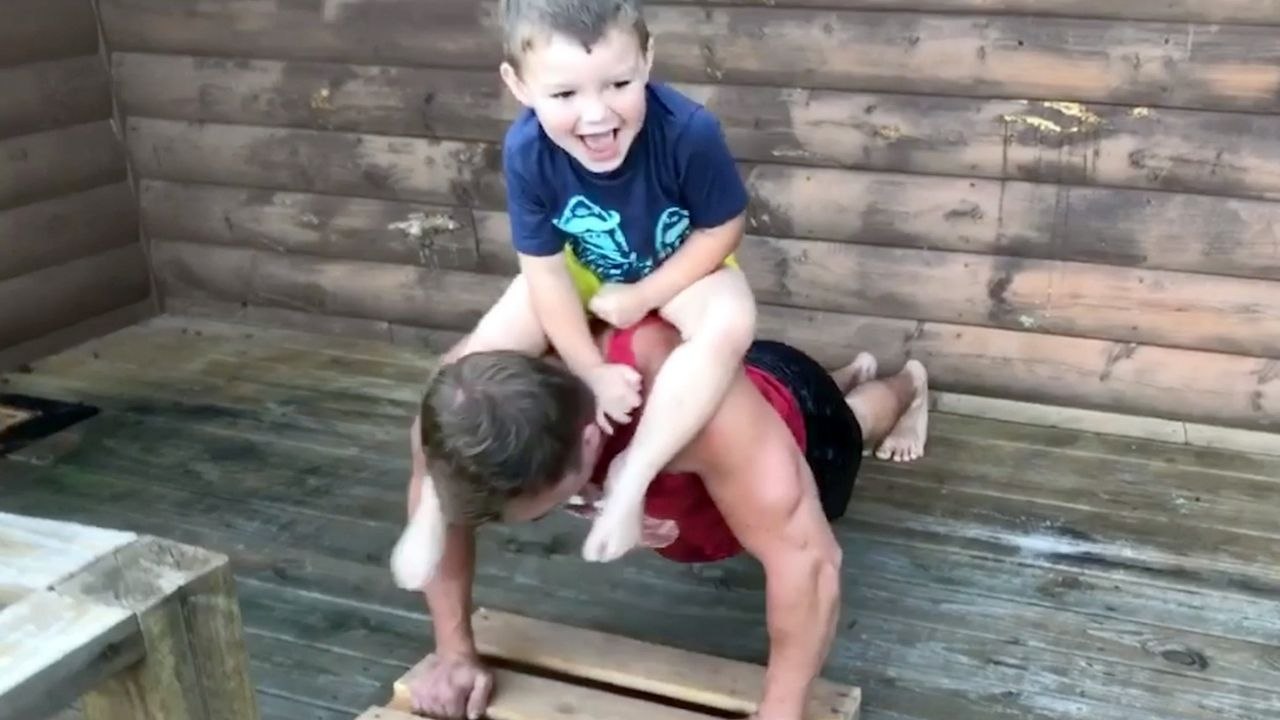 Gym-Mad Dad Works Out Using Kids As Weights | Happily TV