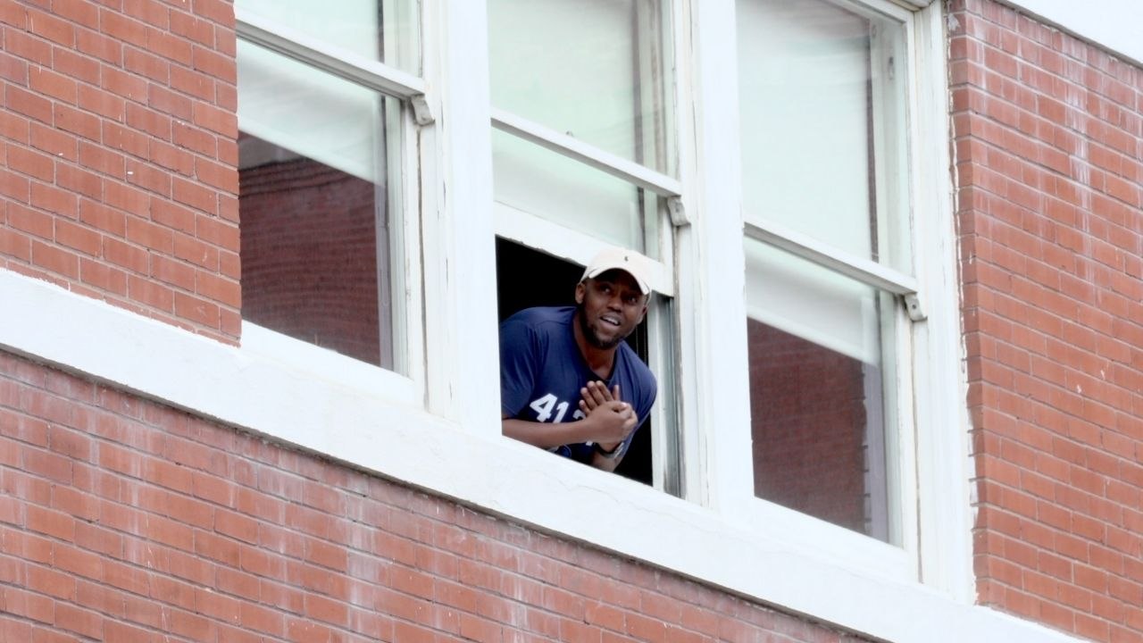 Texas Apartment Block Bursts Into Song | Happily TV