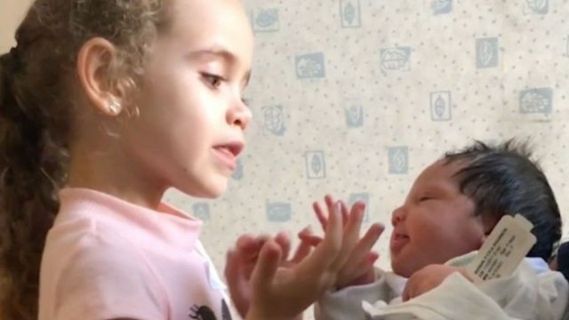 Adorable Girl Sings Lullaby First Time She Meets Newborn Sister | Happily TV