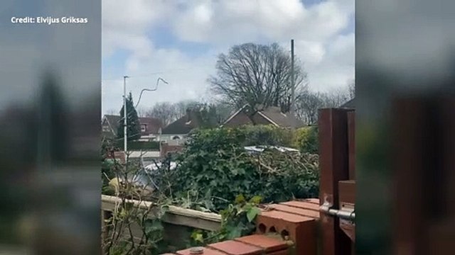 Sparks fly above power lines as Storm Eunice batters Kent