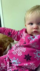 Baby Shares Lollipop with her Dog Friends