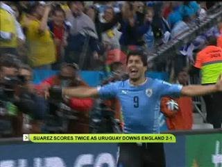 Luis Suarez scores twice as Uruguay downs England 2-1