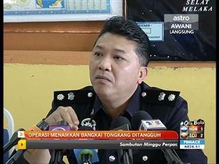 Operasi menaikkan bangkai tongkang tangguh