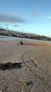 Electric Quad Spinning Donuts on the Beach