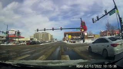 Red Light Runner 'Slides' Through Intersection