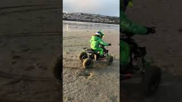 Electric Quad Spinning Donuts on the Beach