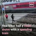 Biker Narrowly Escapes Speeding Rajdhani Express In Mumbai, Video Goes Viral