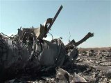 Experts find more MH17 remains despite shelling in east Ukraine