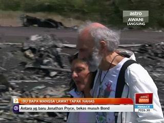 Ibu bapa mangsa lawat tapak nahas MH17