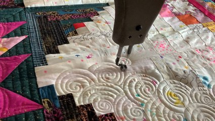 Quiltmaker draws intricate designs with thread