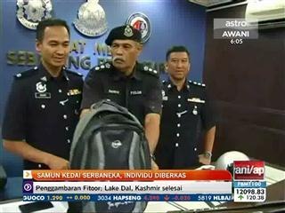 Samun kedai serbaneka, individu diberkas