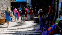Tourists in walk and sightseeing of Bazaar and Old Town in Mostar