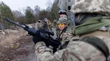 A Ukrainian reservist learns fighting skills she hopes never to use